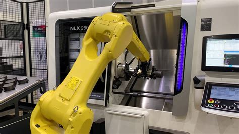 cnc manufacturing cell|cnc machine robot.